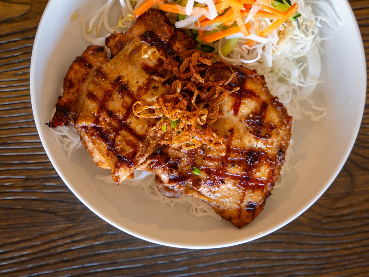 Grilled lemongrass chicken on vermicelli with pickled vegetables